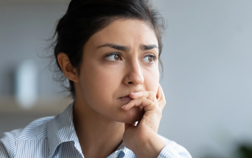 adult showing signs of stress, isolation and procrastination